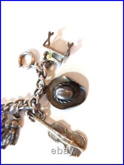 100% Genuine Sterling Silver Vintage Western Charm Bracelet 6 with16 charms 44g 100% Genuine Sterling Silver Vintage Western Charm Bracelet 6 with16 charms 44g