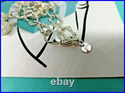 100% Genuine Tiffany & Co dog charm bracelet 7.5inches sterling silver