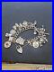 1298-Vintage-Sterling-Silver-Heavy-Charm-Bracelet-01-fort