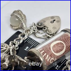 (1456)Vintage sterling silver charm bracelet