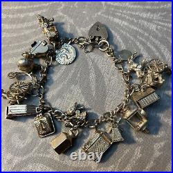 17 silver charm bracelet with charms Most Hinged Piano Bird Pisces Windmill Loco