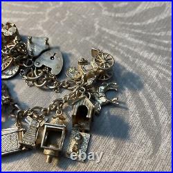 17 silver charm bracelet with charms Most Hinged Piano Bird Pisces Windmill Loco