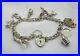 1960-s-Solid-Silver-Charm-Bracelet-With-Heart-Padlock-And-Nine-Silver-Charms-01-nvhn