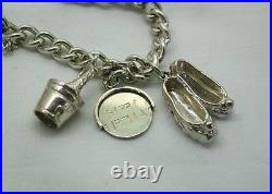 1960's Solid Silver Charm Bracelet With Heart Padlock And Nine Silver Charms