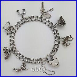 1961 Vintage 925 Sterling Silver Charm Bracelet with Heart Padlock and 7 Charms