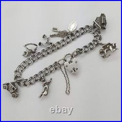 1961 Vintage 925 Sterling Silver Charm Bracelet with Heart Padlock and 7 Charms