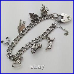 1961 Vintage 925 Sterling Silver Charm Bracelet with Heart Padlock and 7 Charms