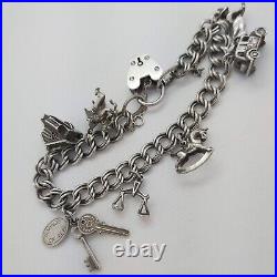 1961 Vintage 925 Sterling Silver Charm Bracelet with Heart Padlock and 7 Charms