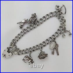 1961 Vintage 925 Sterling Silver Charm Bracelet with Heart Padlock and 7 Charms