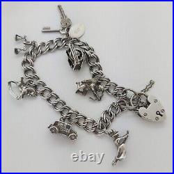 1961 Vintage 925 Sterling Silver Charm Bracelet with Heart Padlock and 7 Charms