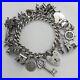 1970-Vintage-925-Sterling-Silver-Charm-Bracelet-with-Heart-Padlock-and-23-Charms-01-qrlg