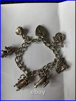 1970's antique silver Stamped charm bracelet with charms