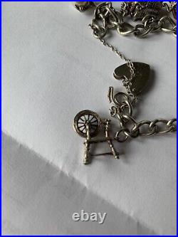 1970's antique silver Stamped charm bracelet with charms