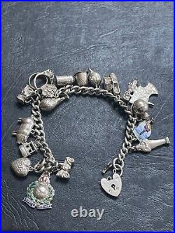 1970s Solid Silver Charm Bracelet With 20 Charms, Enamel Royal Marines Crest