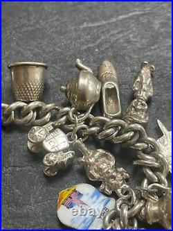 1970s Solid Silver Charm Bracelet With 20 Charms, Enamel Royal Marines Crest