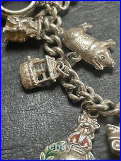 1970s Solid Silver Charm Bracelet With 20 Charms, Enamel Royal Marines Crest