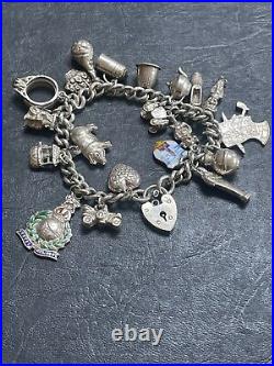 1970s Solid Silver Charm Bracelet With 20 Charms, Enamel Royal Marines Crest