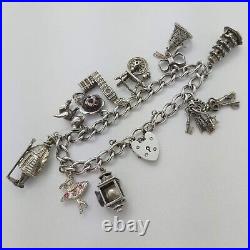 1972 Vintage 925 Sterling Silver Charm Bracelet with Heart Padlock and 10 Charms 1972 Vintage 925 Sterling Silver Charm Bracelet with Heart Padlock and 10 Charms