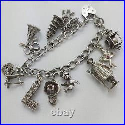 1972 Vintage 925 Sterling Silver Charm Bracelet with Heart Padlock and 10 Charms 1972 Vintage 925 Sterling Silver Charm Bracelet with Heart Padlock and 10 Charms