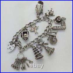 1972 Vintage 925 Sterling Silver Charm Bracelet with Heart Padlock and 10 Charms 1972 Vintage 925 Sterling Silver Charm Bracelet with Heart Padlock and 10 Charms