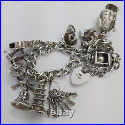 1972 Vintage 925 Sterling Silver Charm Bracelet with Heart Padlock and 10 Charms 1972 Vintage 925 Sterling Silver Charm Bracelet with Heart Padlock and 10 Charms
