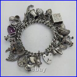 1972 Vintage 925 Sterling Silver Charm Bracelet with Heart Padlock and 31 Charms