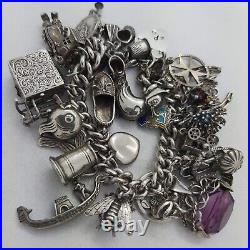 1972 Vintage 925 Sterling Silver Charm Bracelet with Heart Padlock and 31 Charms