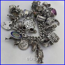 1972 Vintage 925 Sterling Silver Charm Bracelet with Heart Padlock and 31 Charms