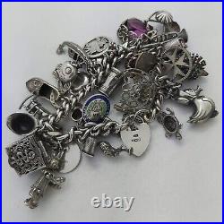 1972 Vintage 925 Sterling Silver Charm Bracelet with Heart Padlock and 31 Charms