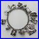 1973-Vintage-925-Sterling-Silver-Charm-Bracelet-with-Heart-Padlock-and-12-Charms-01-fl