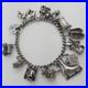 1973-Vintage-925-Sterling-Silver-Charm-Bracelet-with-Heart-Padlock-and-12-Charms-01-iba