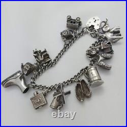 1973 Vintage 925 Sterling Silver Charm Bracelet with Heart Padlock and 12 Charms 1973 Vintage 925 Sterling Silver Charm Bracelet with Heart Padlock and 12 Charms