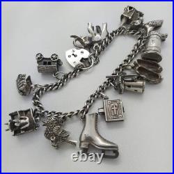 1973 Vintage 925 Sterling Silver Charm Bracelet with Heart Padlock and 12 Charms 1973 Vintage 925 Sterling Silver Charm Bracelet with Heart Padlock and 12 Charms