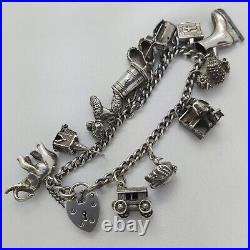 1973 Vintage 925 Sterling Silver Charm Bracelet with Heart Padlock and 12 Charms