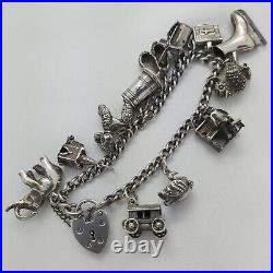 1973 Vintage 925 Sterling Silver Charm Bracelet with Heart Padlock and 12 Charms 1973 Vintage 925 Sterling Silver Charm Bracelet with Heart Padlock and 12 Charms