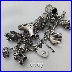 1973 Vintage 925 Sterling Silver Charm Bracelet with Heart Padlock and 12 Charms