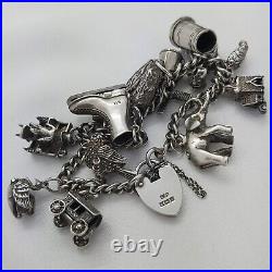 1973 Vintage 925 Sterling Silver Charm Bracelet with Heart Padlock and 12 Charms 1973 Vintage 925 Sterling Silver Charm Bracelet with Heart Padlock and 12 Charms