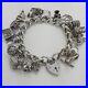 1976-Vintage-925-Sterling-Silver-Charm-Bracelet-with-Heart-Padlock-and-17-Charms-01-xwy