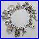 1977-Vintage-925-Sterling-Silver-Charm-Bracelet-with-Heart-Padlock-and-13-Charms-01-btm