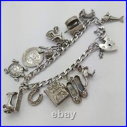 1977 Vintage 925 Sterling Silver Charm Bracelet with Heart Padlock and 13 Charms