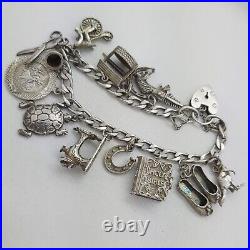 1977 Vintage 925 Sterling Silver Charm Bracelet with Heart Padlock and 13 Charms