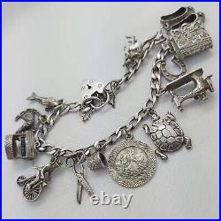 1977 Vintage 925 Sterling Silver Charm Bracelet with Heart Padlock and 13 Charms