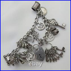 1977 Vintage 925 Sterling Silver Charm Bracelet with Heart Padlock and 15 Charms