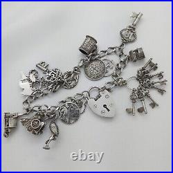 1977 Vintage 925 Sterling Silver Charm Bracelet with Heart Padlock and 15 Charms