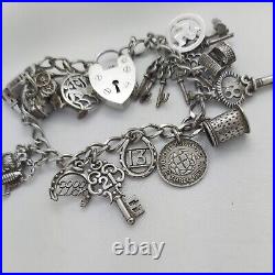 1977 Vintage 925 Sterling Silver Charm Bracelet with Heart Padlock and 15 Charms