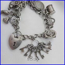 1977 Vintage 925 Sterling Silver Charm Bracelet with Heart Padlock and 15 Charms