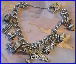 1978 Charm Bracelet Solid Sterling Silver -11 Charms -36.2g. Please Read Info