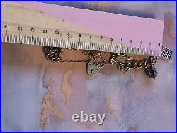 1978 Charm Bracelet Solid Sterling Silver -11 Charms -36.2g. Please Read Info