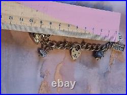 1978 Charm Bracelet Solid Sterling Silver -11 Charms -36.2g. Please Read Info