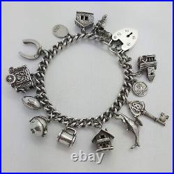 1979 Vintage 925 Sterling Silver Charm Bracelet with Heart Padlock and 13 Charms